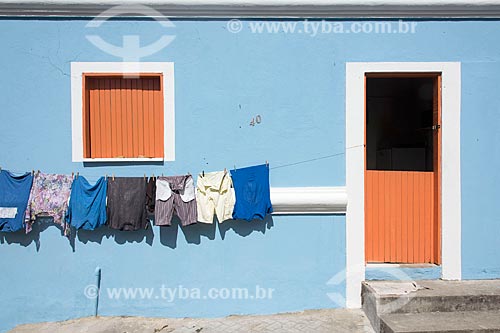  Facade of house with clothes line outside  - Guaramiranga city - Ceara state (CE) - Brazil