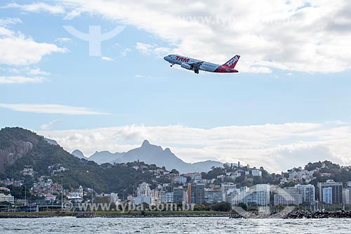  View of airplane of TAM Airlines taking off of the Santos Dumont Airport from Guanabara Bay  - Rio de Janeiro city - Rio de Janeiro state (RJ) - Brazil
