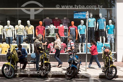  Motorcycles parking with shop window of clothing store in the background  - Fortaleza city - Ceara state (CE) - Brazil