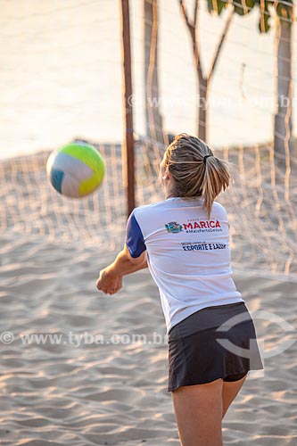  Detail of young of the Esporte Presente Program - Department of Sport and Leisure of the Municipality of Marica playing beach volleyball - Aracatiba Lagoon waterfront  - Marica city - Rio de Janeiro state (RJ) - Brazil