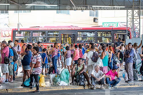  Passengers - People of Marica Bus Station - old Jacinto Luis Caetano Bus Terminal - with the bus of the Public Transport Company of the Municipality of Marica in the background  - Marica city - Rio de Janeiro state (RJ) - Brazil