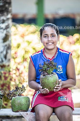  Municipal school student growing vegetables - Horta in the Coconut Project - Secretariat of Agriculture, Livestock and Fisheries of the Municipality of Marica  - Marica city - Rio de Janeiro state (RJ) - Brazil