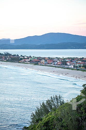  View of houses - Ponta Negra district between the sea and Guarapina Lagoon during the sunset  - Marica city - Rio de Janeiro state (RJ) - Brazil