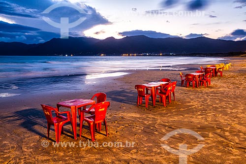  Bar tables on Pantano do Sul Beach waterfront during the sunset  - Florianopolis city - Santa Catarina state (SC) - Brazil