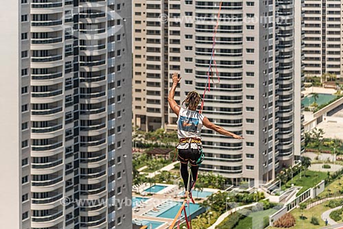  Practitioner of slackline between the buildings of Pura Island Village of Athletes - Residential Condominium where athletes stayed during the Olympic Games - Rio 2016  - Rio de Janeiro city - Rio de Janeiro state (RJ) - Brazil