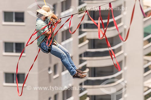  Practitioner of slackline riding the strip between the buildings of Pura Island Village of Athletes - Residential Condominium where athletes stayed during the Olympic Games - Rio 2016  - Rio de Janeiro city - Rio de Janeiro state (RJ) - Brazil