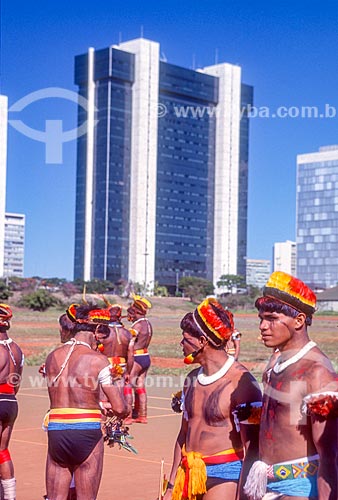  Indigenous occupation in Brasilia with the Bank of Brazil headquarters building in the background  - Brasilia city - Distrito Federal (Federal District) (DF) - Brazil
