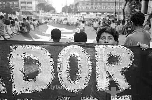  Snippet of poster that say: Dor (pain) during manifestation - Direct Elections Now  - Rio de Janeiro city - Rio de Janeiro state (RJ) - Brazil