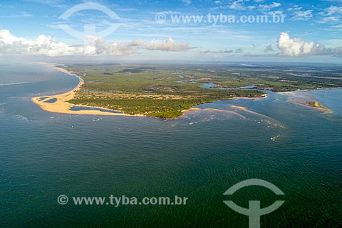  Picture taken with drone of the mouth of Sao Francisco River - Peba Cape - boundary between Sergipe and Alagoas states  - Brejo Grande city - Sergipe state (SE) - Brazil