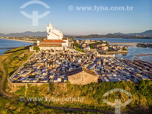  Picture taken with drone of the Our Lady of Nazareth Church (1837) and the Municipal Cemetery of Saquarema during the sunset  - Saquarema city - Rio de Janeiro state (RJ) - Brazil