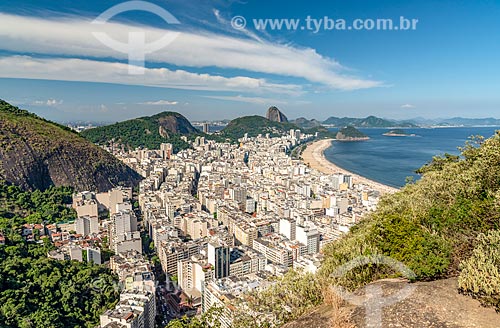  View of Copacabana neighborhood during the Cantagalo Hill trail with the Sugarloaf in the background  - Rio de Janeiro city - Rio de Janeiro state (RJ) - Brazil