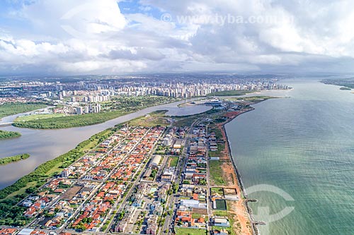  Picture taken with drone of the Coroa do meio neighborhood with the Poxim River - to the left - with the Sergipe River and the July Thirteen neighborhood in the background  - Aracaju city - Sergipe state (SE) - Brazil