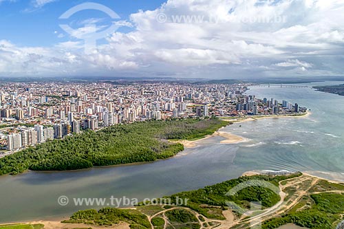  Picture taken with drone of the Poxim river mouth with the Sergipe River - to the right - and the July Thirteen neighborhood in the background  - Aracaju city - Sergipe state (SE) - Brazil