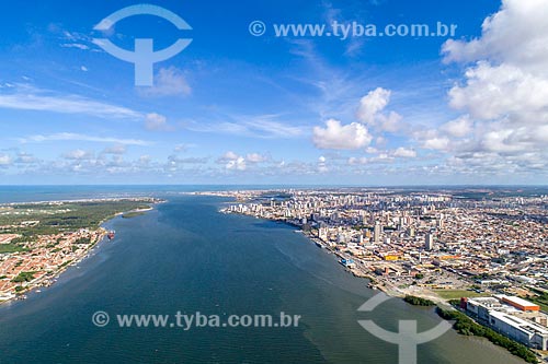  Picture taken with drone of snippet of the Sergipe River with the Barra dos Coqueiros city - to the left - and Aracaju city - to the right  - Aracaju city - Sergipe state (SE) - Brazil