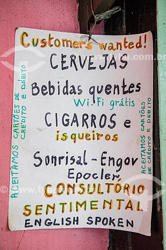  Detail of poster stating the sale of alcoholic drink, cigarettes, remedy and sentimental office - Barraca Ja Disse - Luiz Gonzaga Northeast Traditions Centre  - Rio de Janeiro city - Rio de Janeiro state (RJ) - Brazil