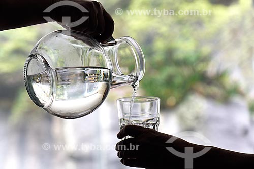  Mineral water being served in a glass  - Rio de Janeiro city - Rio de Janeiro state (RJ) - Brazil