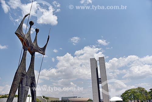  Sculpture Os Guerreiros (The Warriors) - also known as Os Candangos - with the National Congress in the background  - Brasilia city - Distrito Federal (Federal District) (DF) - Brazil