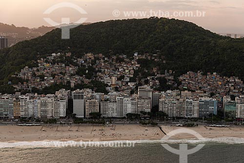  Aerial photo of the Leme Beach waterfront with the Chapeu Mangueira Hill during the sunset  - Rio de Janeiro city - Rio de Janeiro state (RJ) - Brazil