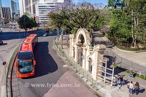  Picture taken with drone of the portal of Passeio Publico of Curitiba (1886) with bus of Integrated Collective Transport Network (RIT)  - Curitiba city - Parana state (PR) - Brazil
