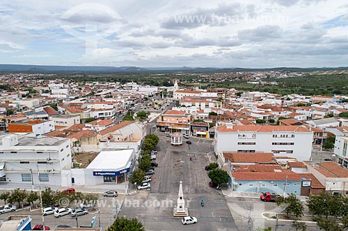  Picture taken with drone of the Coronel Jose Bezerra Avenue with the Saint Anne Church (1808) in the background  - Currais Novos city - Rio Grande do Norte state (RN) - Brazil