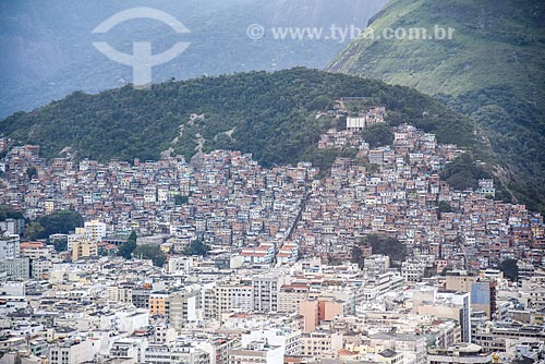  Aerial photo of the buildings of Copacabana neighborhood with the Pavao Pavaozinho slum in the background  - Rio de Janeiro city - Rio de Janeiro state (RJ) - Brazil