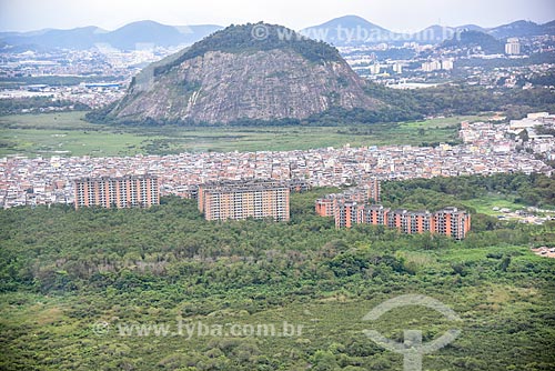  Aerial photo of the abandoned buildings near to Rio das Pedras Slum with the Rock of Panela in the background  - Rio de Janeiro city - Rio de Janeiro state (RJ) - Brazil