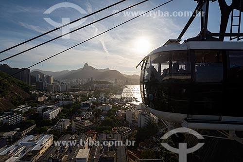  Cable car making the crossing to Urca Mountain with the Christ the Redeemer in the background  - Rio de Janeiro city - Rio de Janeiro state (RJ) - Brazil