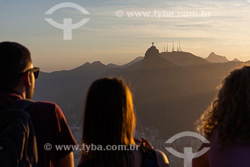  People observing the sunset from Sugarloaf mirante with the Christ the Redeemer in the background  - Rio de Janeiro city - Rio de Janeiro state (RJ) - Brazil