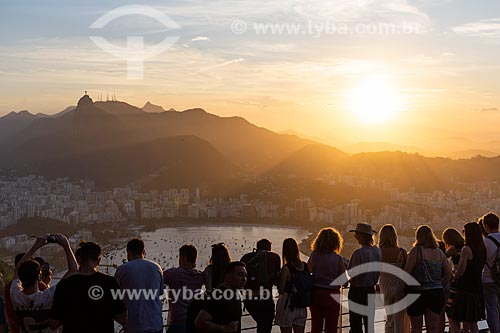  People observing the sunset from Sugarloaf mirante with the Christ the Redeemer in the background  - Rio de Janeiro city - Rio de Janeiro state (RJ) - Brazil