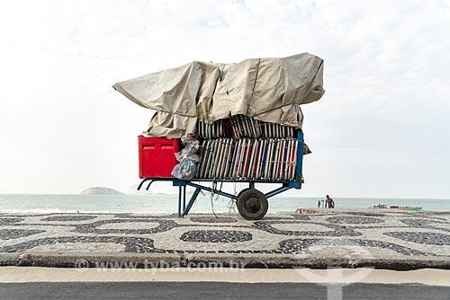  Detail of cargo trolley - man carrying a cart - with beach chairs - Ipanema Beach waterfront  - Rio de Janeiro city - Rio de Janeiro state (RJ) - Brazil