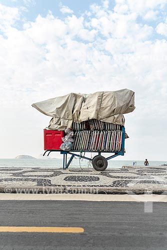  Detail of cargo trolley - man carrying a cart - with beach chairs - Ipanema Beach waterfront  - Rio de Janeiro city - Rio de Janeiro state (RJ) - Brazil