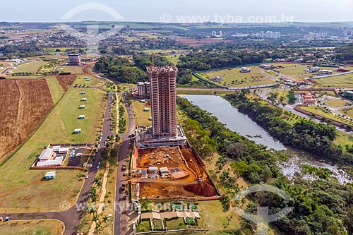  Picture taken with drone of the Olhos DAgua (Water Eyes) Park with the residential condominium  - Ribeirao Preto city - Sao Paulo state (SP) - Brazil
