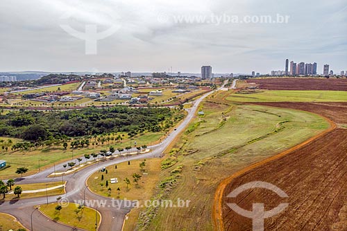  Picture taken with drone of the canavial nart to Olhos DAgua (Water Eyes) Park with the residential condominium in the background  - Ribeirao Preto city - Sao Paulo state (SP) - Brazil