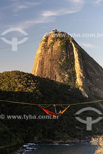  Practitioner of slackline in hammock with the Sugarloaf in the background  - Rio de Janeiro city - Rio de Janeiro state (RJ) - Brazil