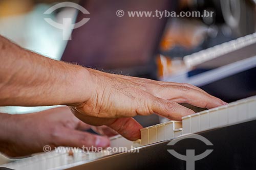  Detail of musician hand playing the electric piano  - Guarani city - Minas Gerais state (MG) - Brazil