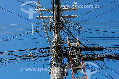  Labourer of EDP - power transmission services concessionaire - doing the maintaining the electrical network  - Caraguatatuba city - Sao Paulo state (SP) - Brazil