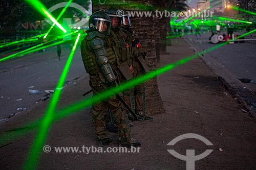 Demonstrations against the Sebastián Piñera government, social inequality and repression - Protesters using lasers to avoid facial recognition