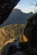  Man laying on rocky edge during sunset - View of the Caixa de Fosforo Peak - Tres Picos State Park  - Teresopolis city - Rio de Janeiro state (RJ) - Brazil