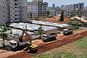  Withdrawal of earth with backhoe on street to be paved  - Sao Jose do Rio Preto city - Sao Paulo state (SP) - Brazil