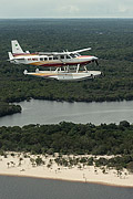  Seaplane flying over the Amazon rainforest  - Amazonas state (AM) - Brazil