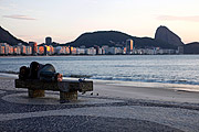  Homeless person sleeping on a bench on the edge of Copacabana Beach during quarantine - Coronavirus Crisis  - Rio de Janeiro city - Rio de Janeiro state (RJ) - Brazil