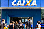  Queue in front of Caixa Economica Federal agency to receive emergency government aid - Coronavirus Crisis  - Capao da Canoa city - Rio Grande do Sul state (RS) - Brazil