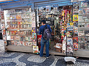  Customer with mask buying at newsstand in Cinelandia - Coronavirus Crisis  - Rio de Janeiro city - Rio de Janeiro state (RJ) - Brazil