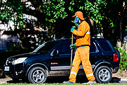  Street sweeper wearing Gremio mask while doing urban cleaning - Coronavirus Crisis  - Porto Alegre city - Rio Grande do Sul state (RS) - Brazil
