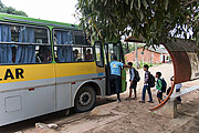  Indigenous children getting on school bus - Tupiniquim ethnic group Pau Brasil  - Aracruz city - Espirito Santo state (ES) - Brazil