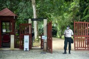 Guard with protective equipment at the entrance to the Botanical Garden of Rio de Janeiro - Coronavirus Crisis - Rio de Janeiro city - Rio de Janeiro state (RJ) - Brazil
