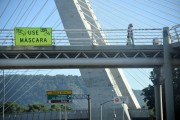 Walkway over Armando Lombardi Avenue with sign encouraging the use of a mask - Rio de Janeiro city - Rio de Janeiro state (RJ) - Brazil