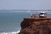 Van with tourists on the top of the cliff known as Mirante do Chapadao - Tibau city - Rio Grande do Norte state (RN) - Brazil