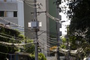 Posts with electrical conductive wires and telephone cables - Sao Paulo city - Sao Paulo state (SP) - Brazil