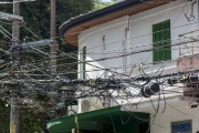 Post with excess wires from cable TV and internet operators in the Jardins region - Sao Paulo city - Sao Paulo state (SP) - Brazil